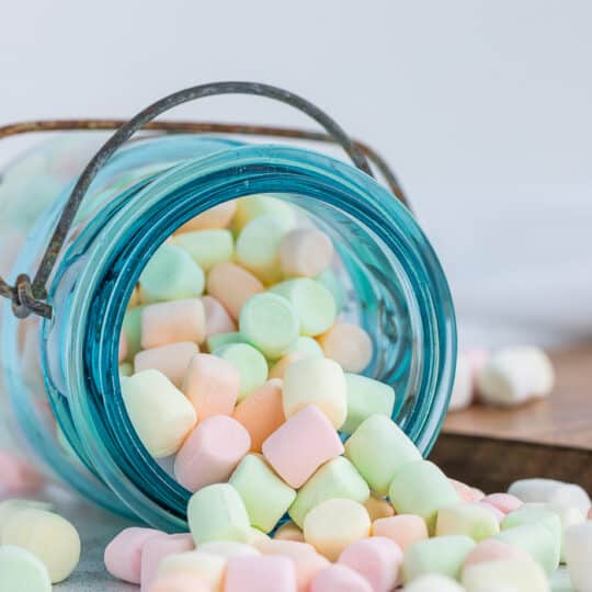 colorful mini dried marshmallows in a blue canning jar