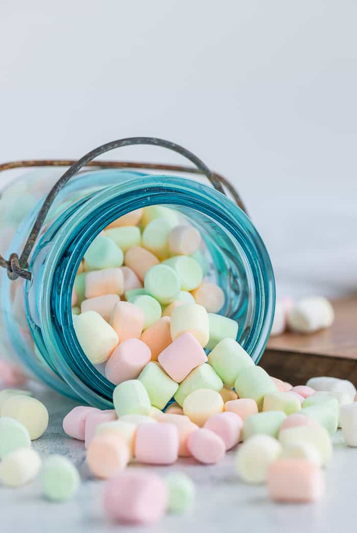 colorful mini dried marshmallows in a blue canning jar