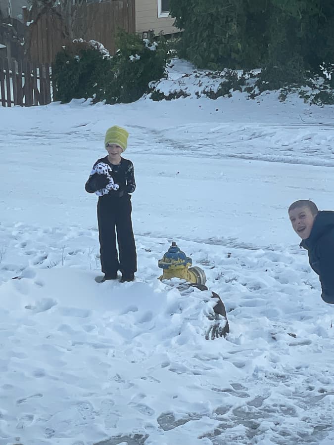 kids playing in the snow