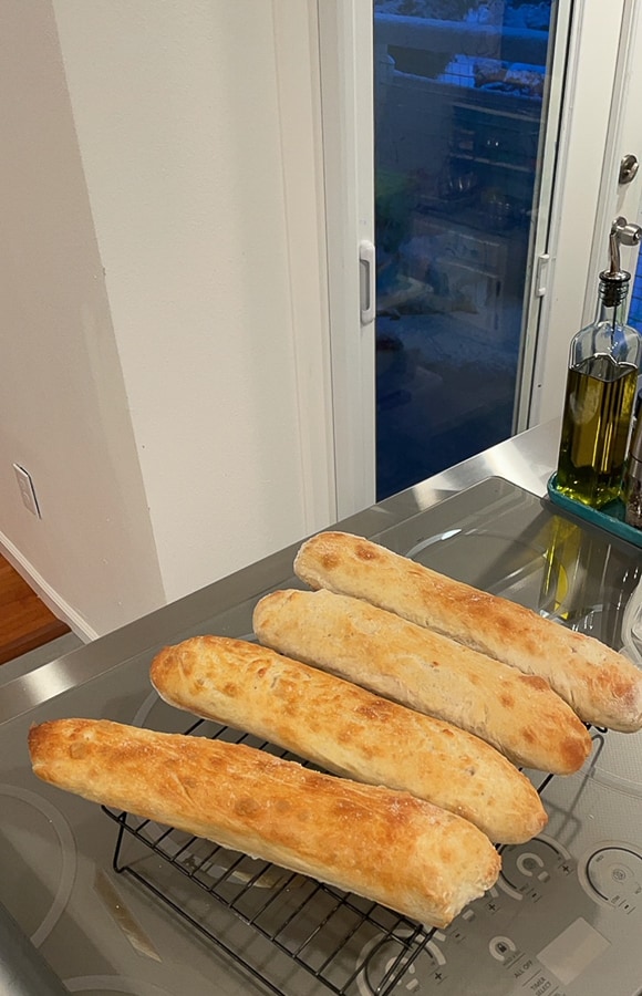 4 baguettes on a cooling rack