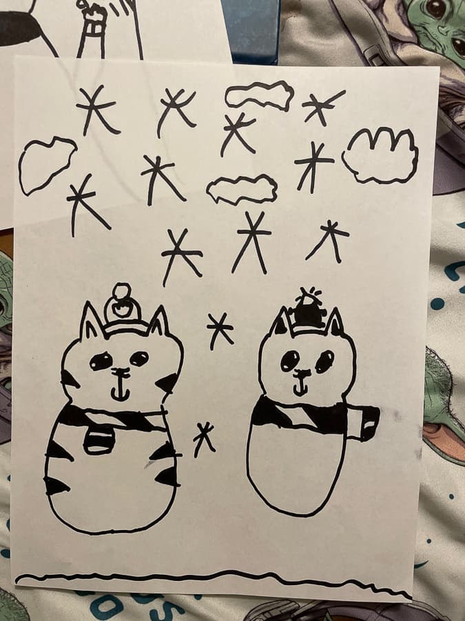 a drawing of 2 cats