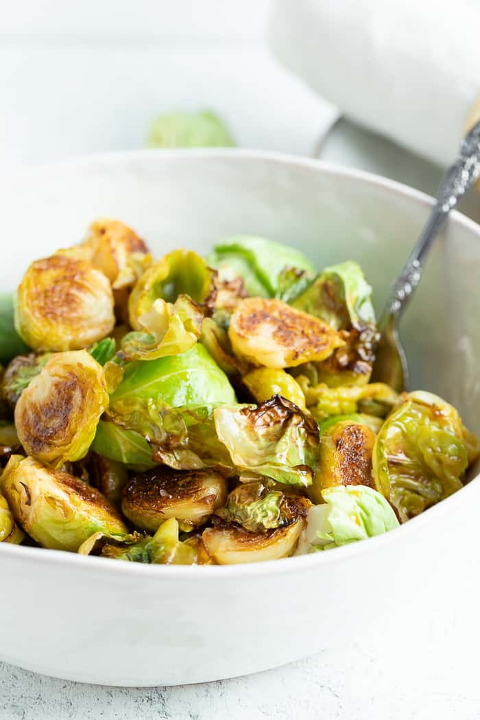 a close up image of roasted brussel sprouts