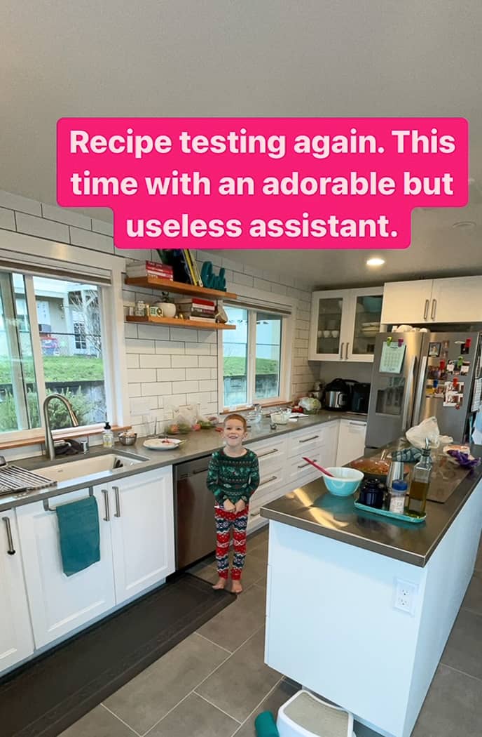 a little kid in a kitchen