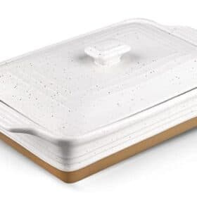 a white speckled baking dish with a brown bottom