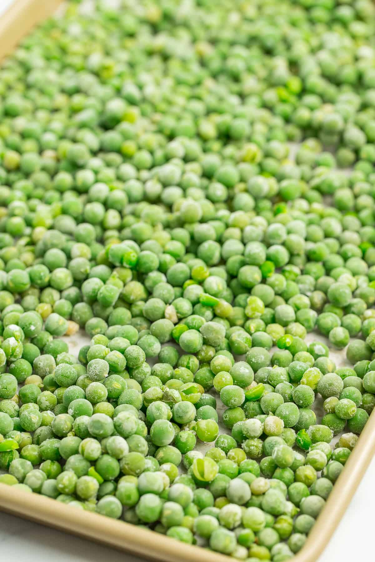 frozen peas on a tray.