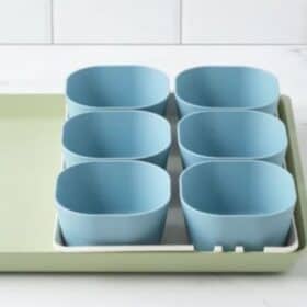 a tray with 3 prep bowls on it