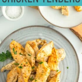 a plate of air fryer chicken tenders without breading topped with parsley.
