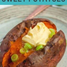 a whole air fryer roasted sweet potato topped with butter and green onions.