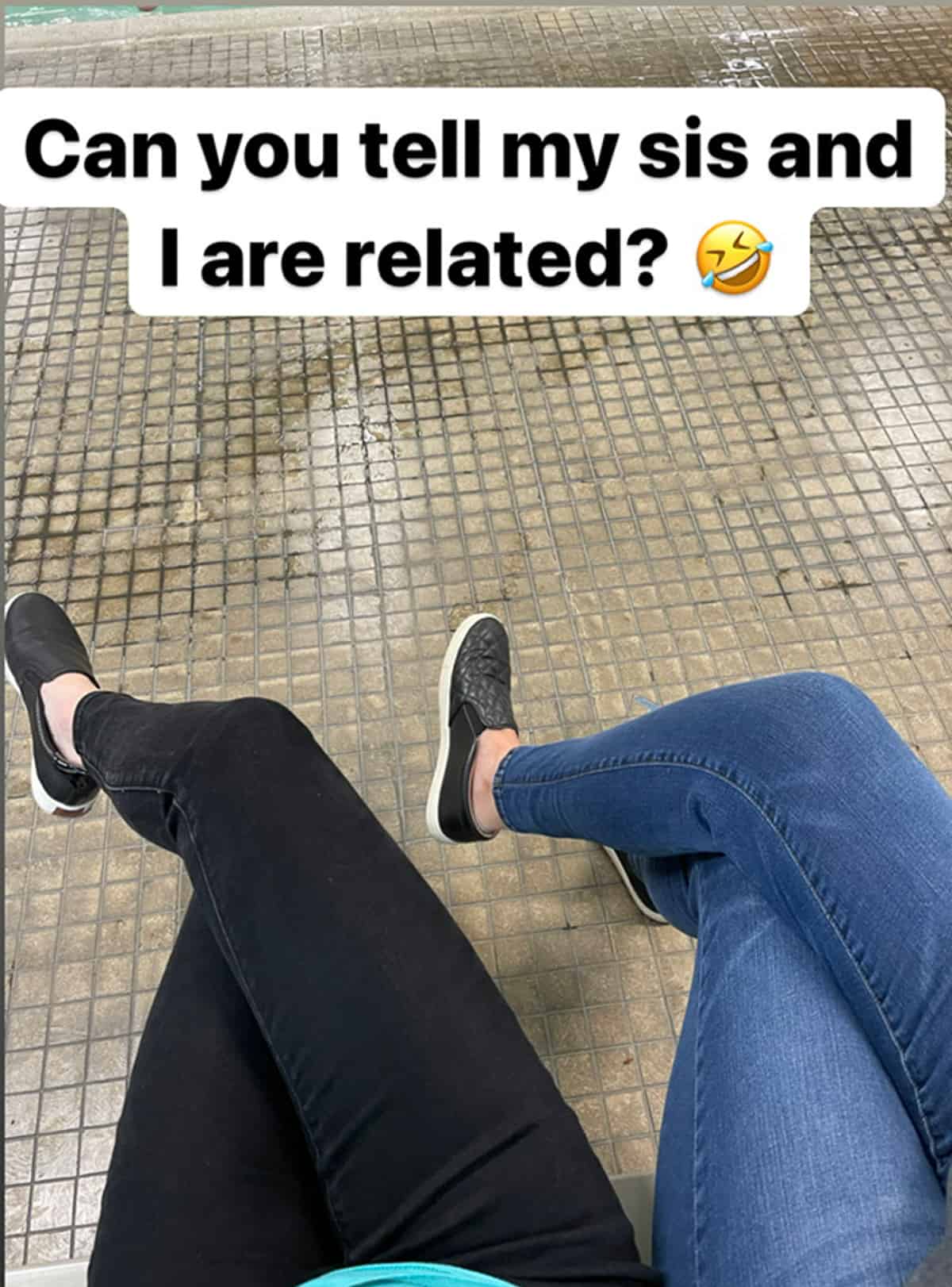 2 women wearing the same shoes with their legs crossed in the exact same way.