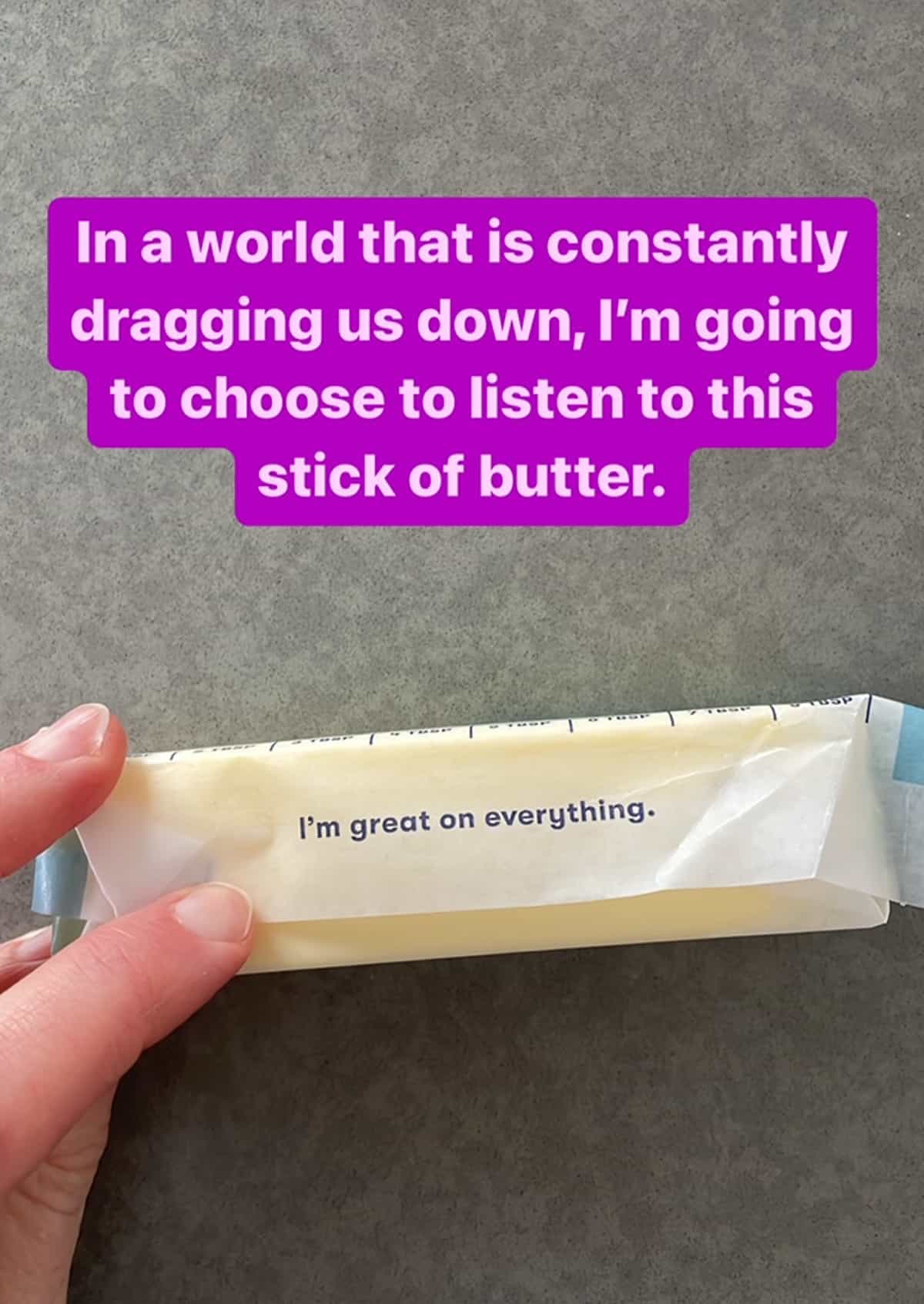 a stick of butter with an inspirational message on the wrapper.