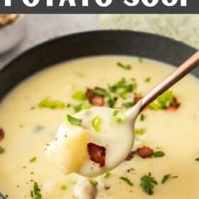 a spoonful of potato soup over a bowl.