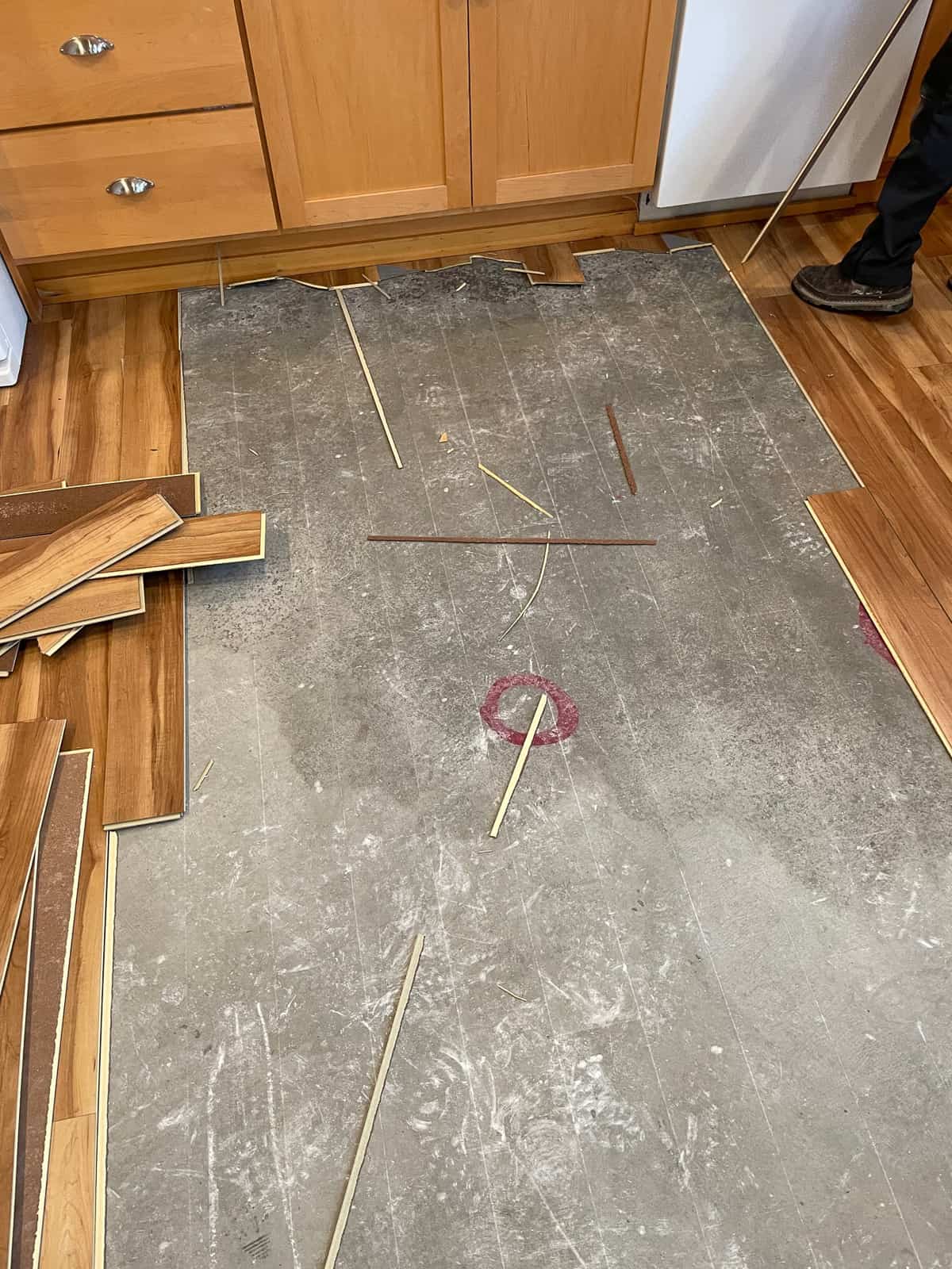 a floor with water damage.