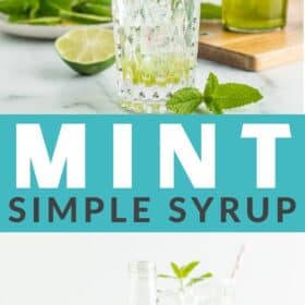 a glass bottle of green mint syrup with fresh mint and limes on a white board.