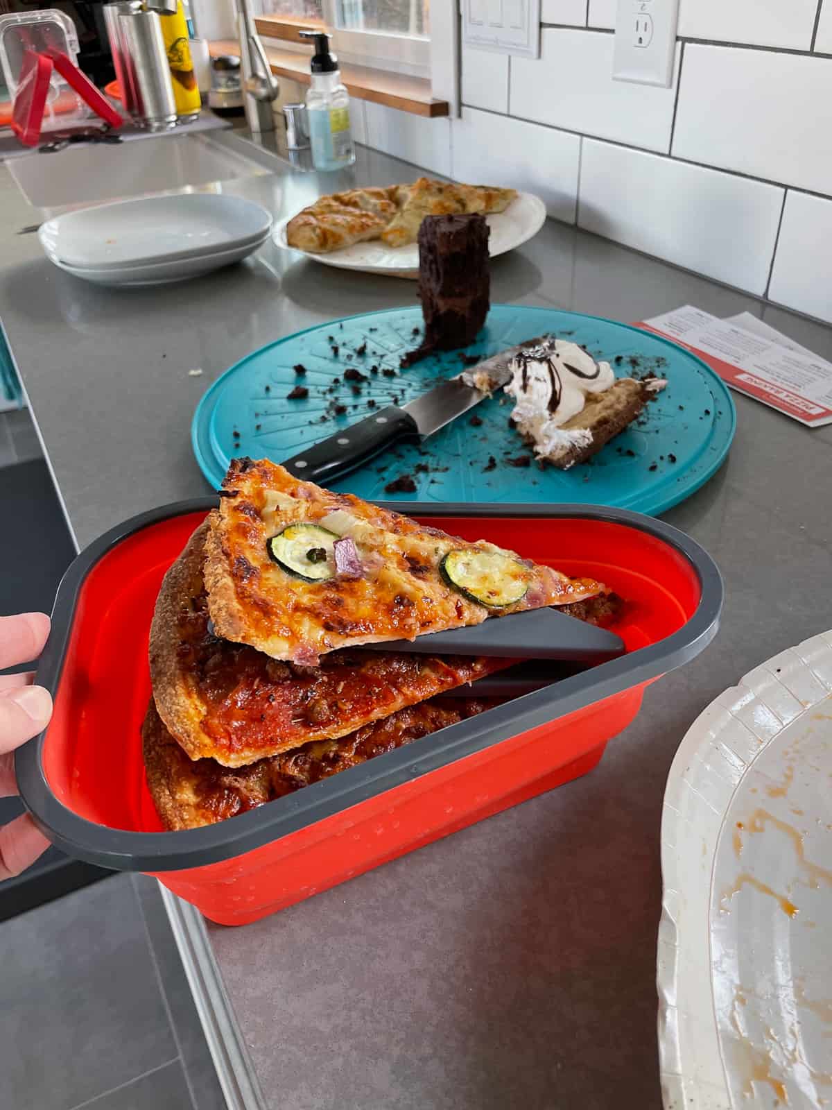 a pizza holder in a kitchen.