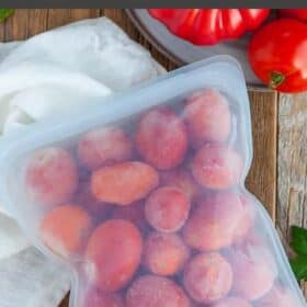 frozen tomatoes in a reusable silicone bag.