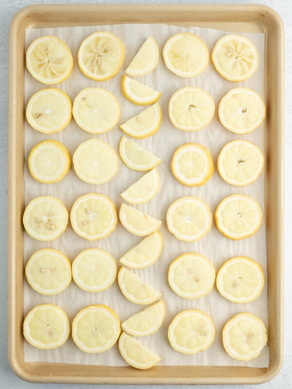 a baking tray with lemon slices.