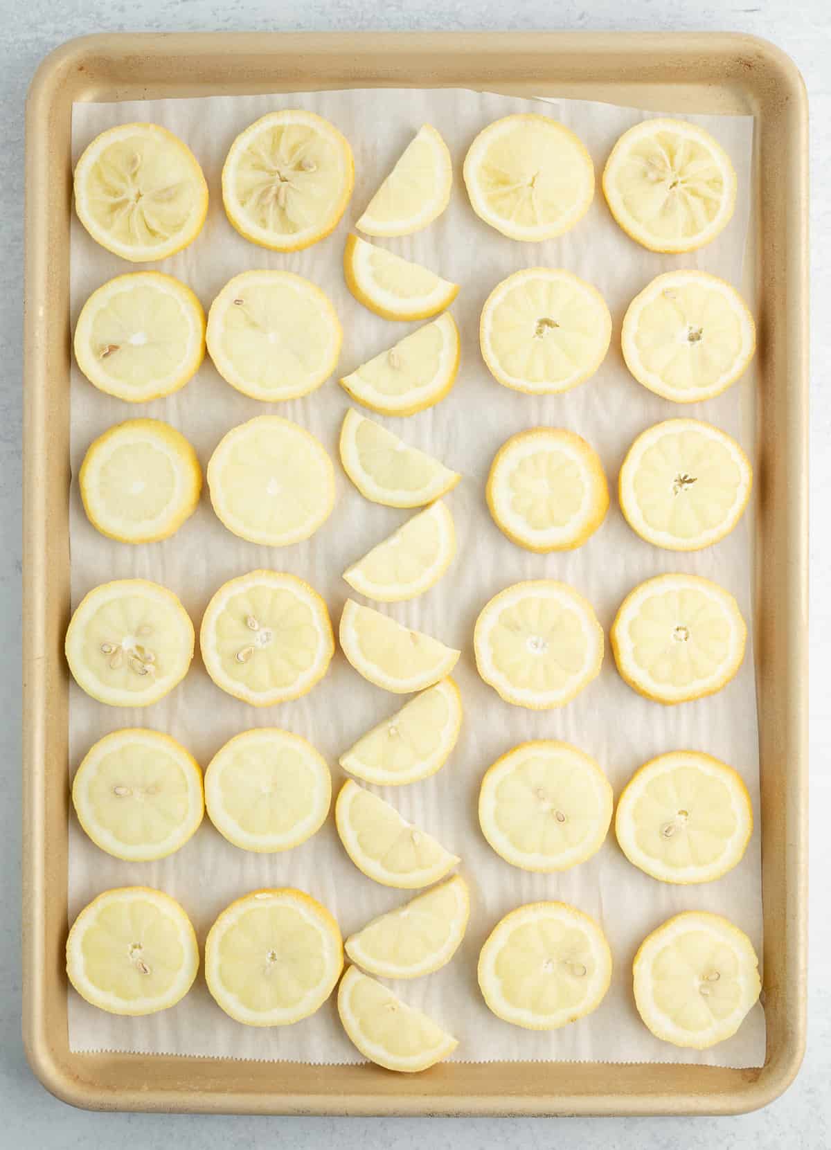 a baking tray with lemon slices.