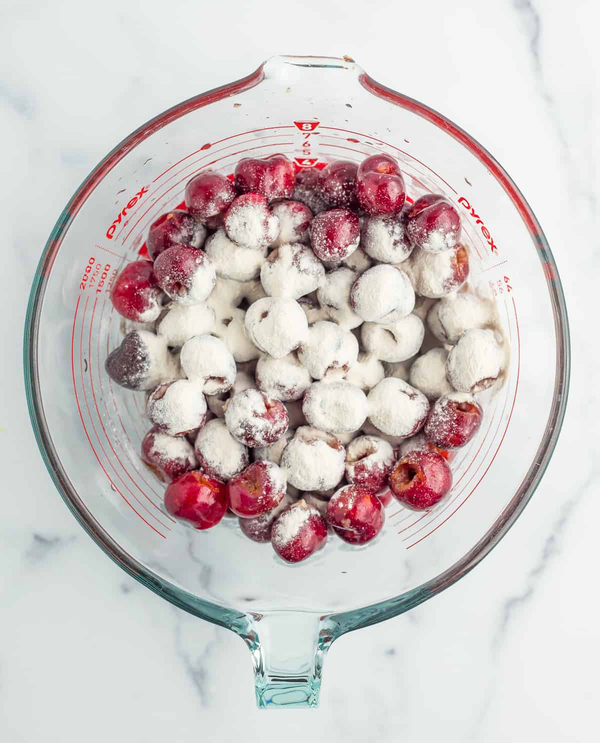 cherries with cornstarch in a bowl.