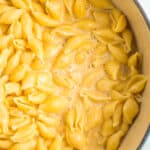 a cast iron dutch oven with smoked gouda mac and cheese.