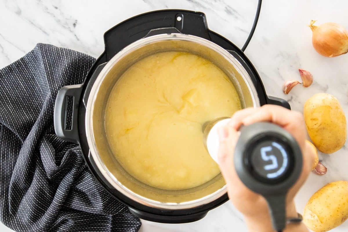 an immersion blender in an Instant Pot.