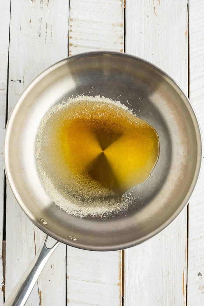 sugar caramelizing in a skillet.