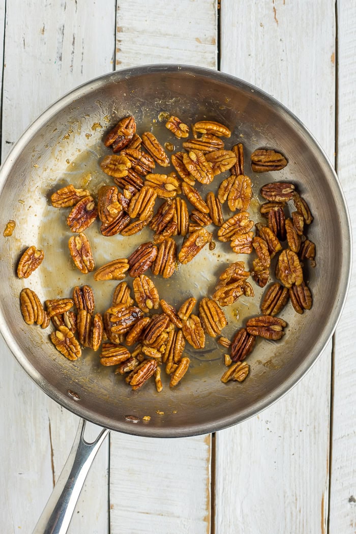 toasted pecans in a skillet.