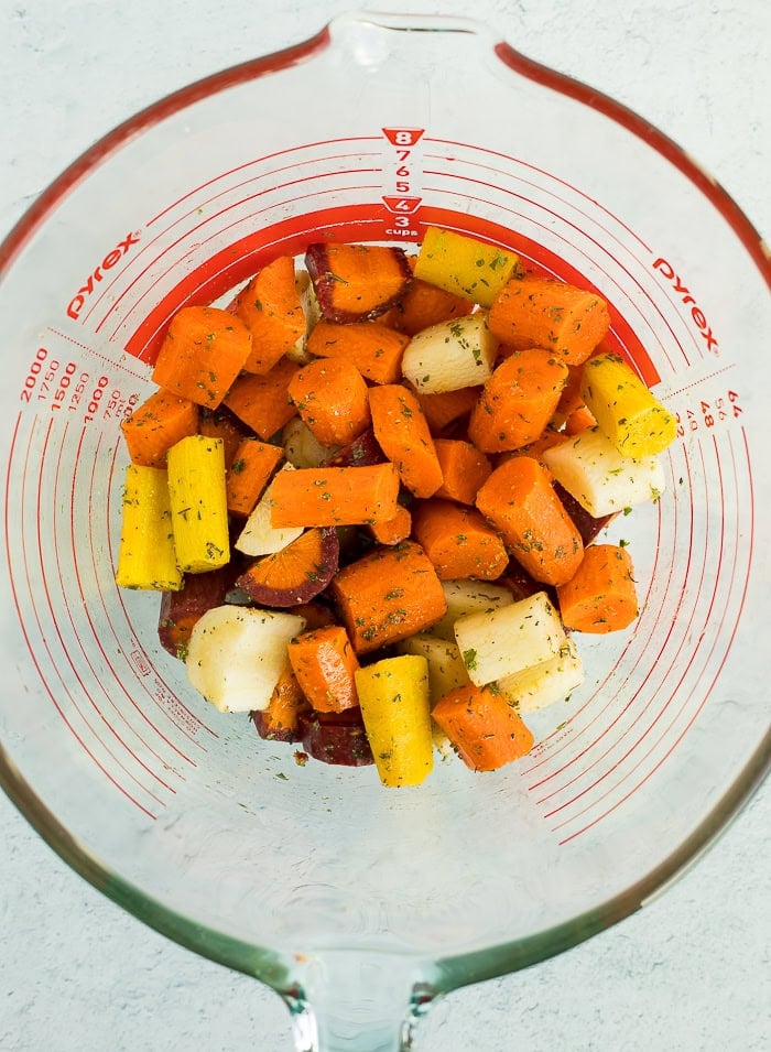 chopped carrots in a glass bowl.