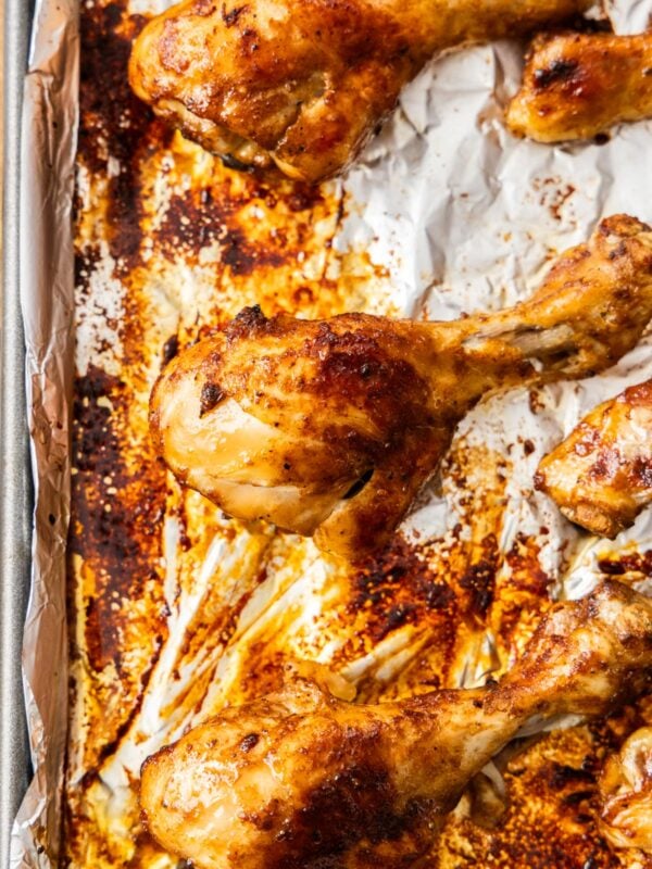 chicken legs on a sheet pan with foil.