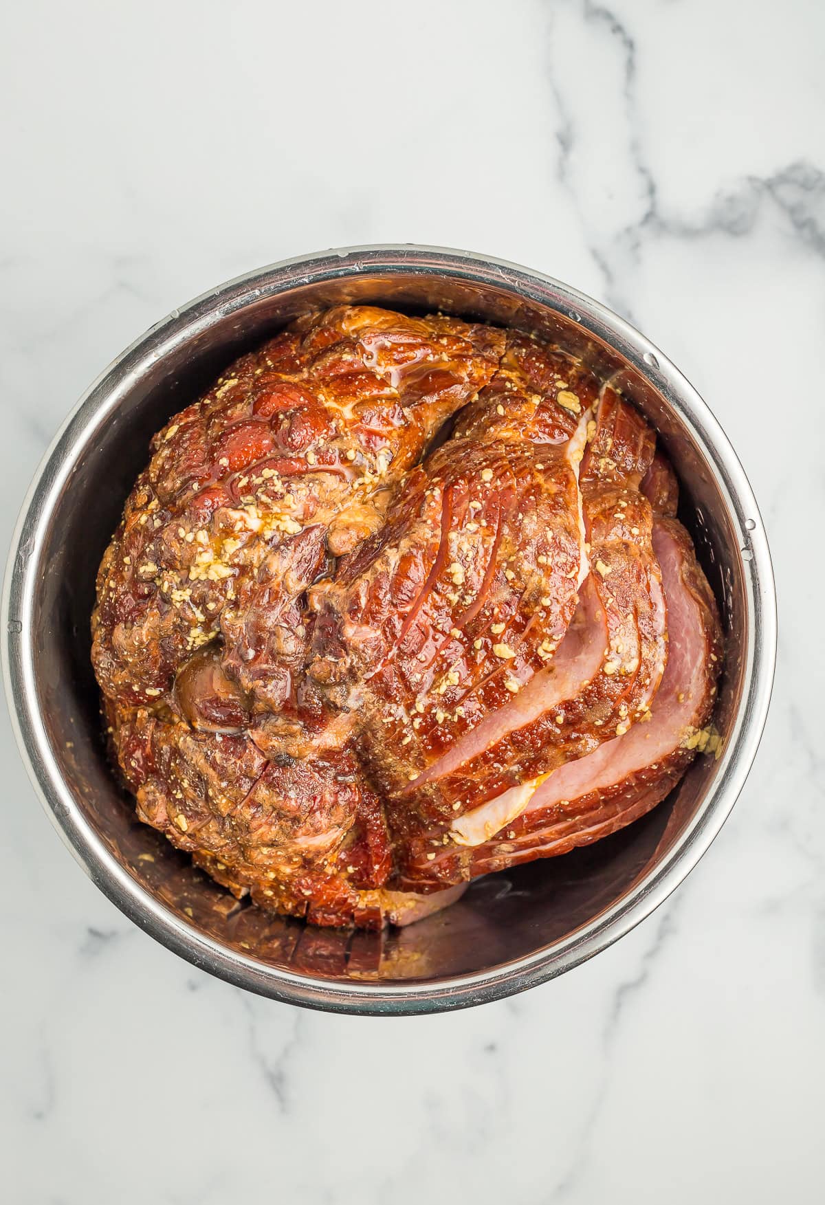 an uncooked spiral ham in the Instant Pot.