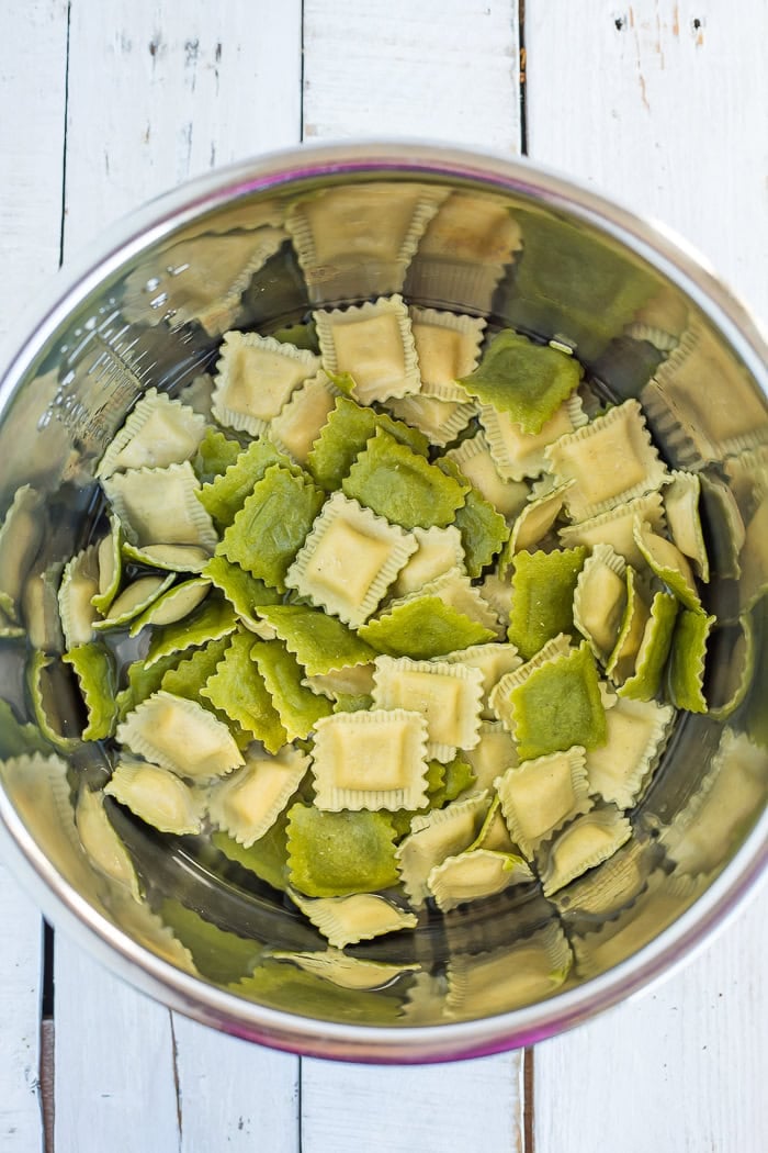 colorful pasta in a stainless pot.