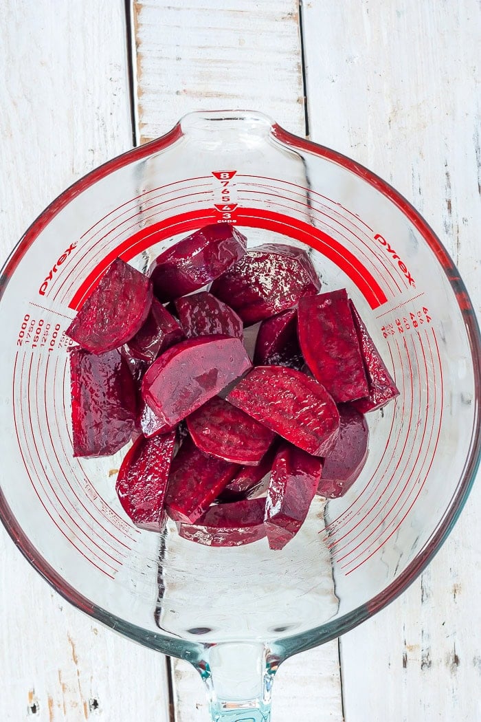 sliced beets in a glass bowl.