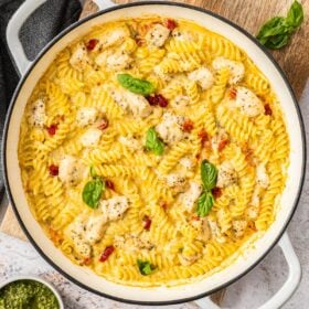 Marry me chicken casserole in a white skillet.