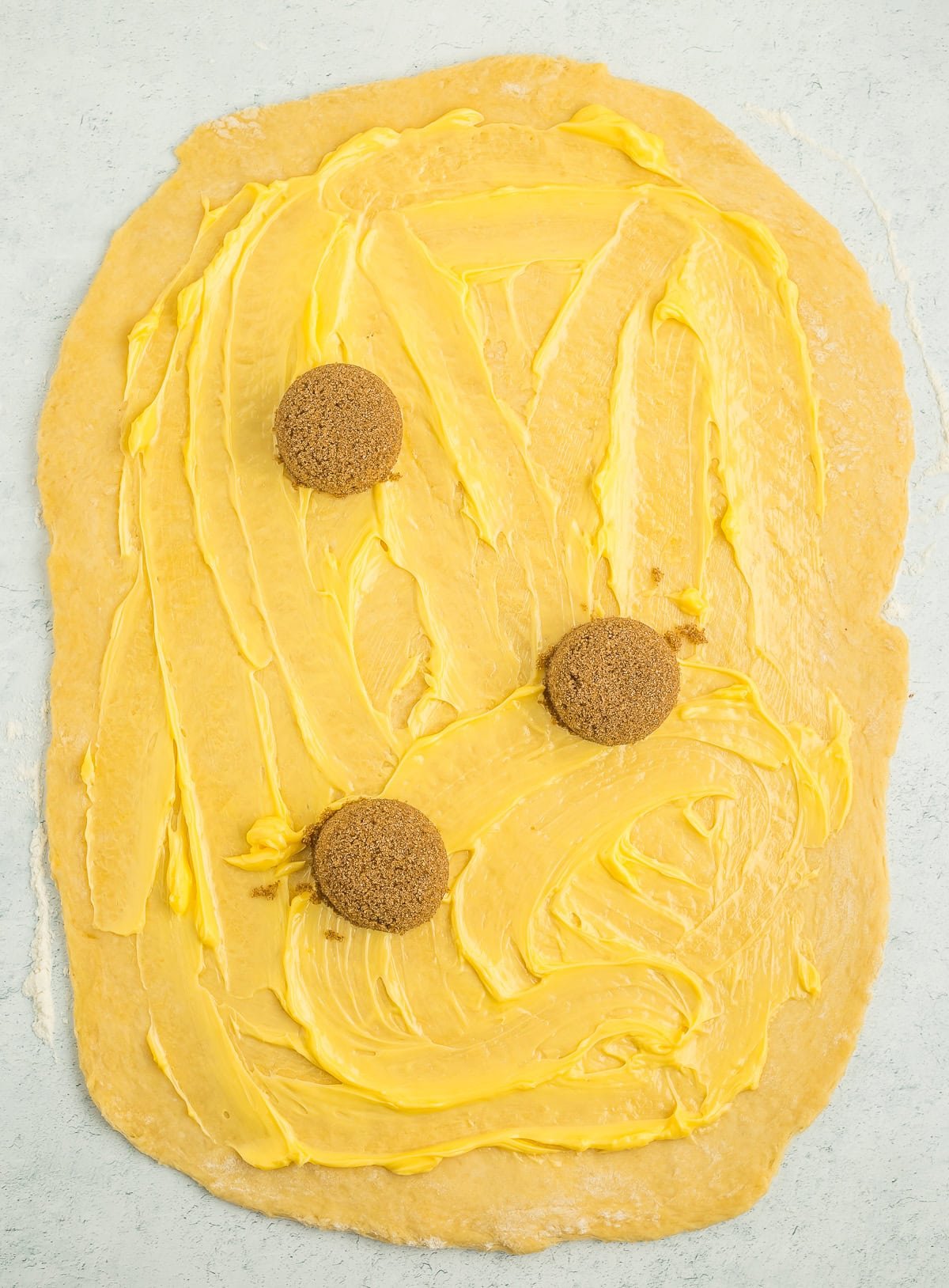 rolled dough with butter and brown sugar.