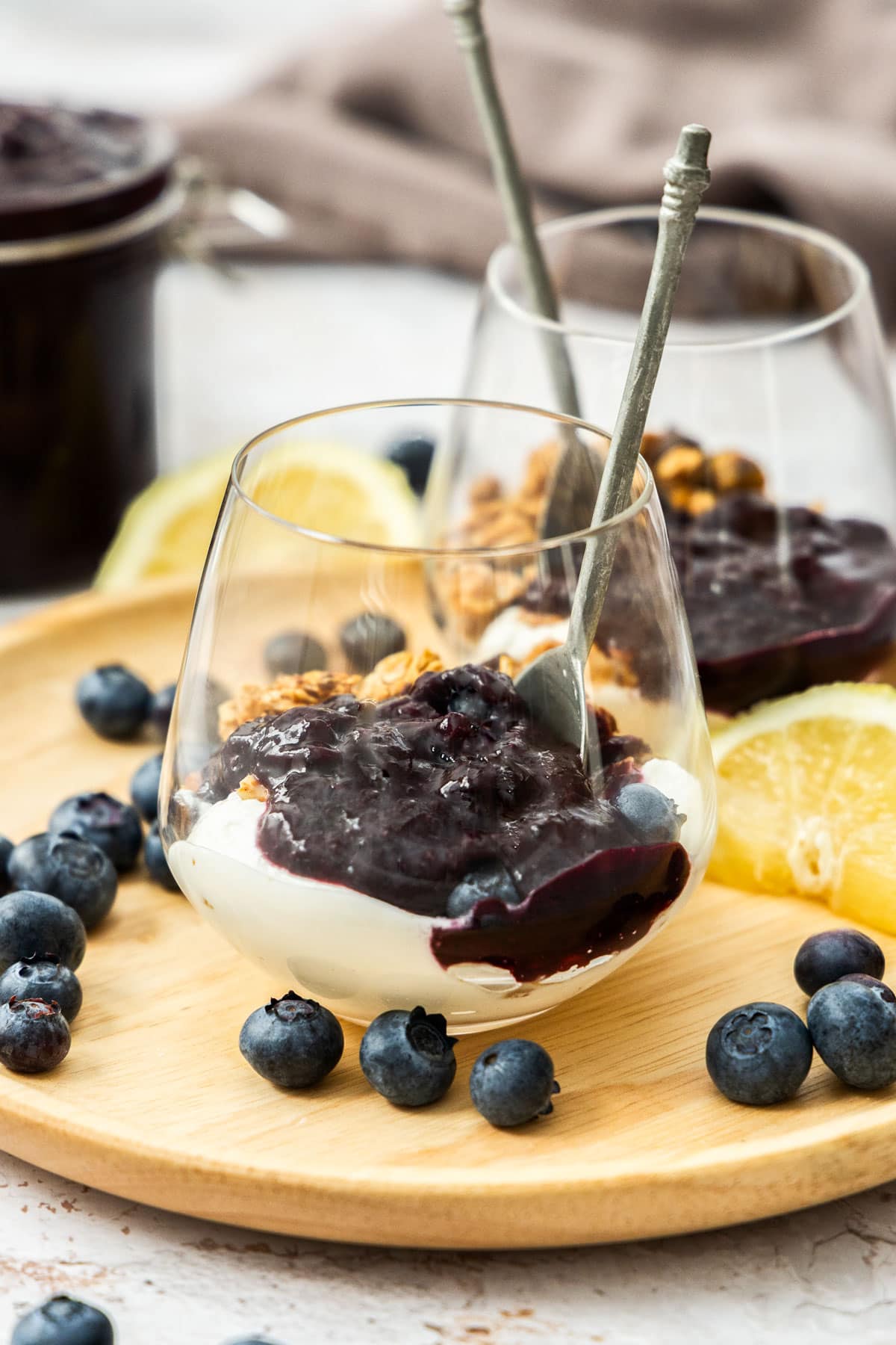 glasses full of yogurt with fruit compote.
