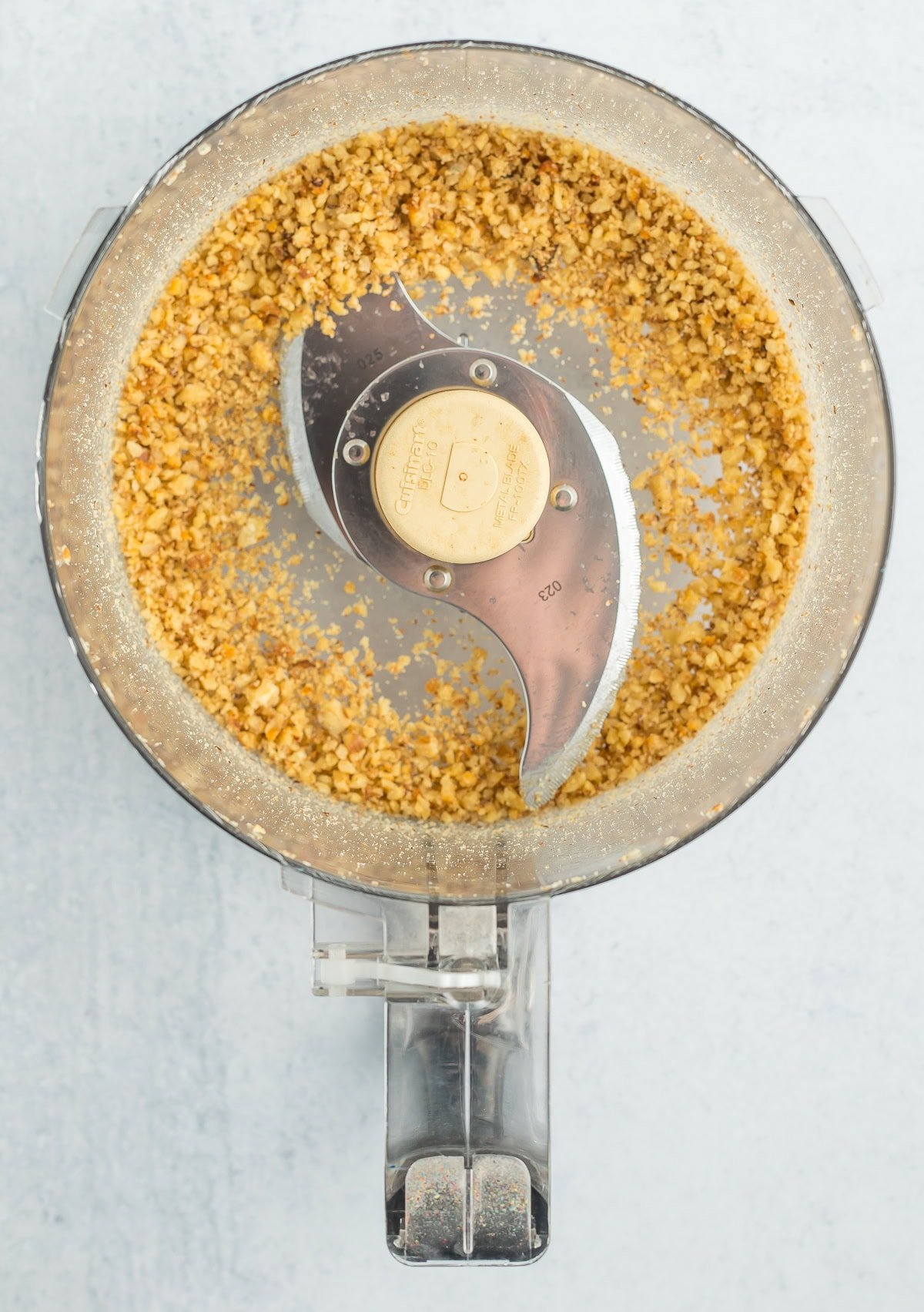 chopped walnuts in a food processor.