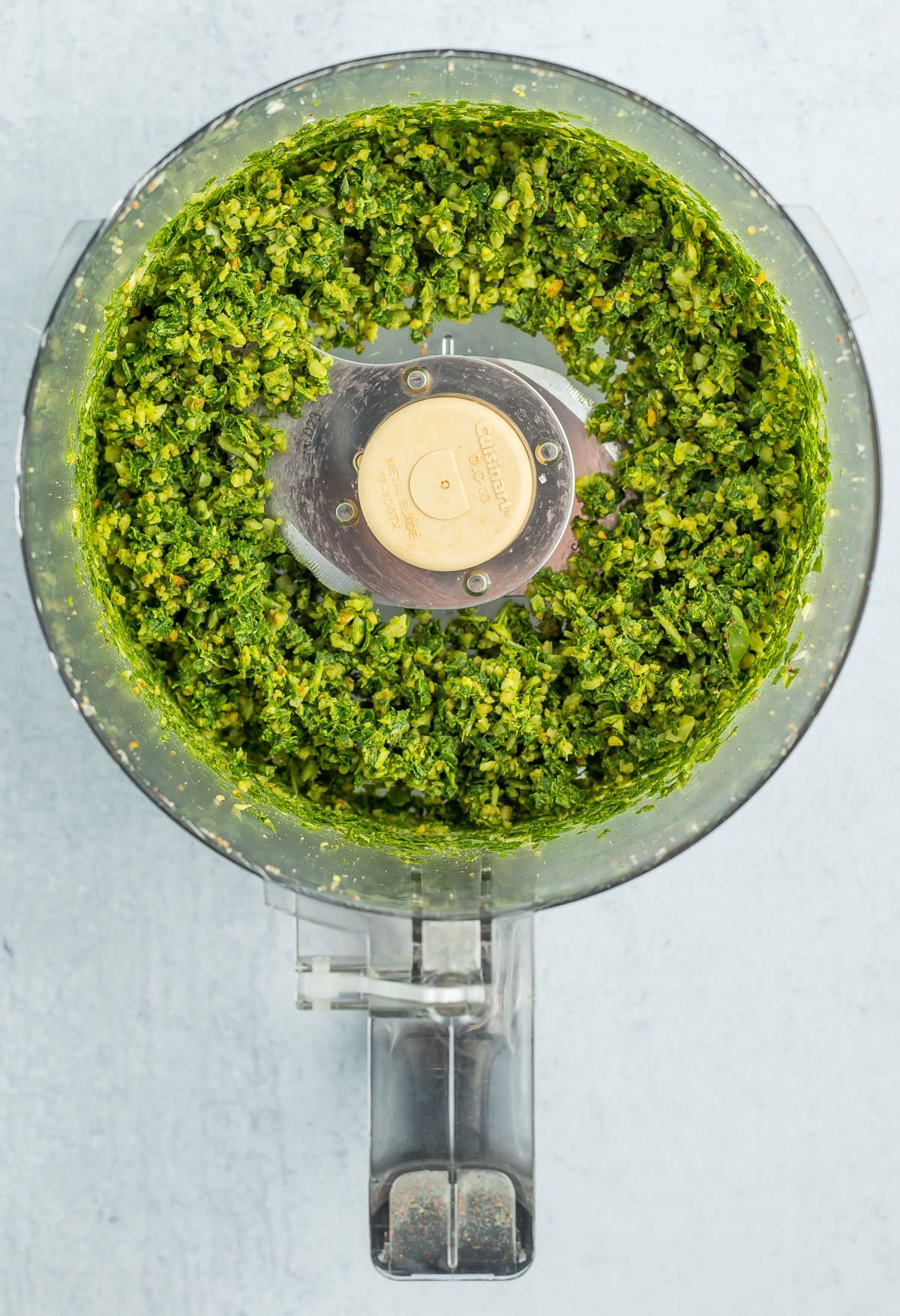 chopped basil in a food processor.