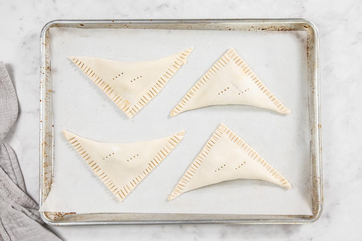 unbaked dough on a baking sheet.