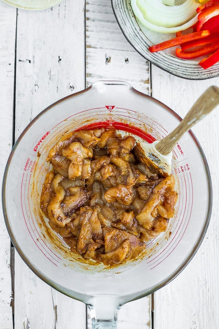 sliced chicken in a glass bowl.