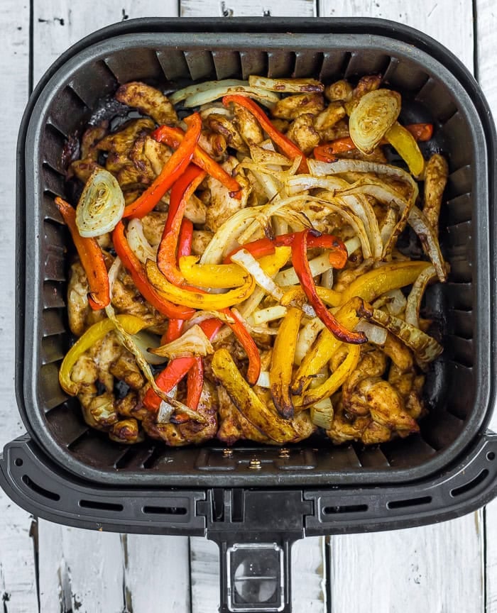 grilled chicken, peppers, and onions.