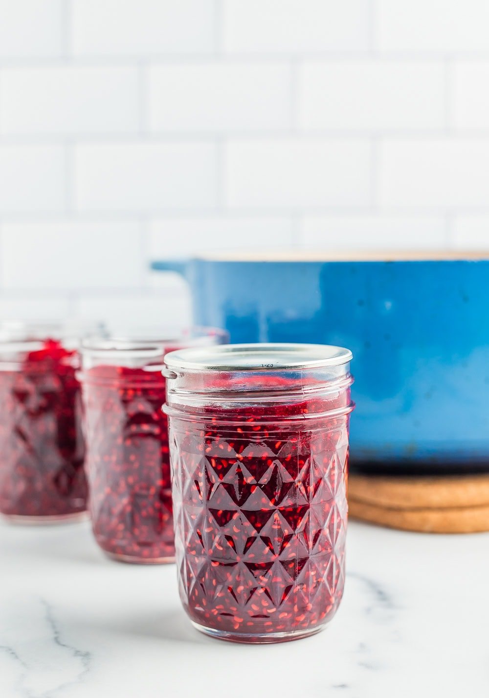a canning jar with a lid on it.