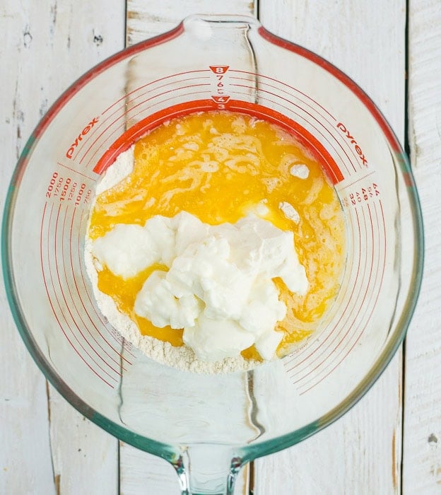 butter and yogurt in a glass bowl.