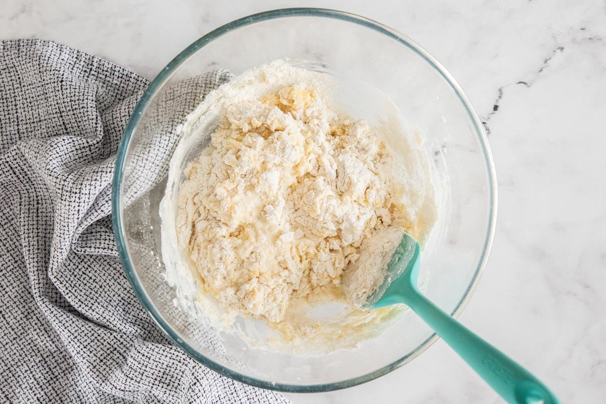 unbaked dough in a glass bowl.