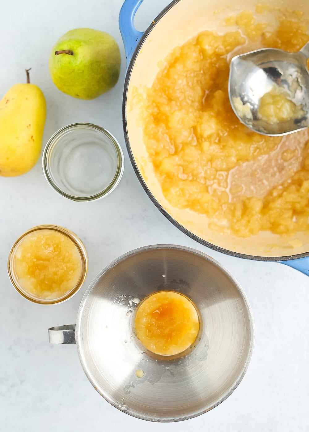 a canning jar with a funnel in it.