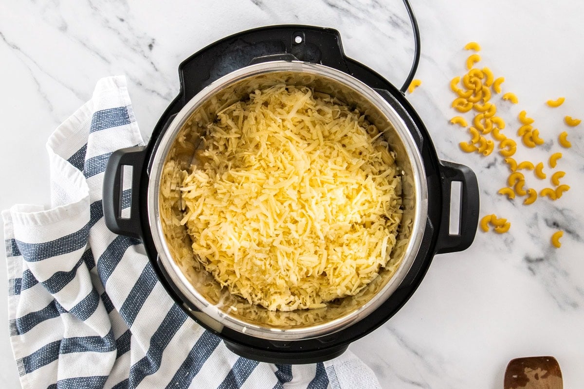 shredded cheddar in a pressure cooker.
