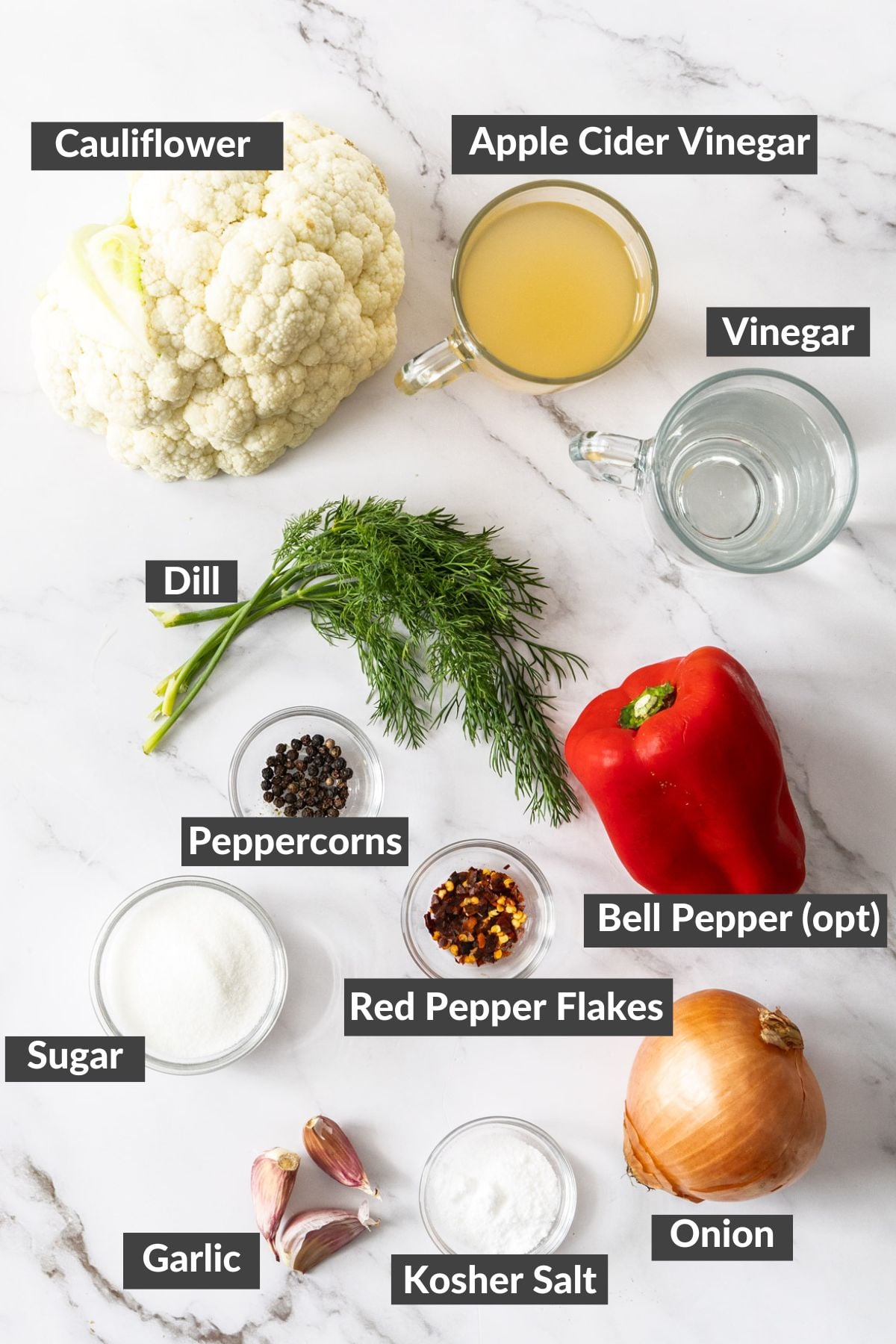 ingredients on a white marbled board.