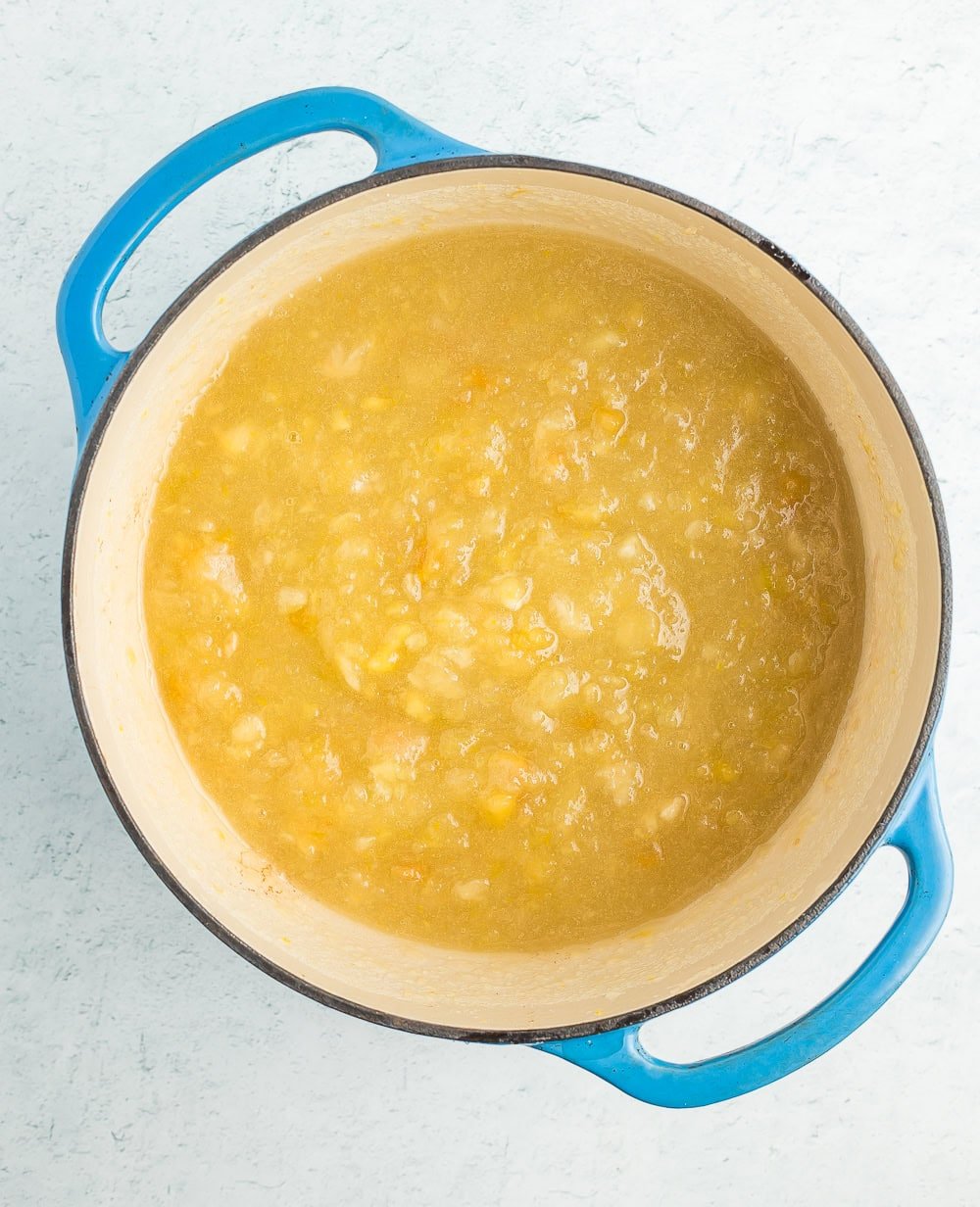 ingredients in a blue Dutch oven.