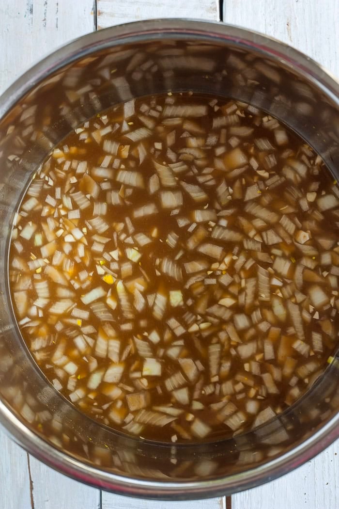onions and broth in a pressure cooker.
