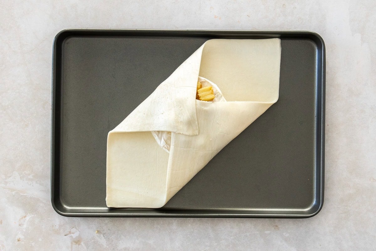 the process of showing how to fold puff pastry.