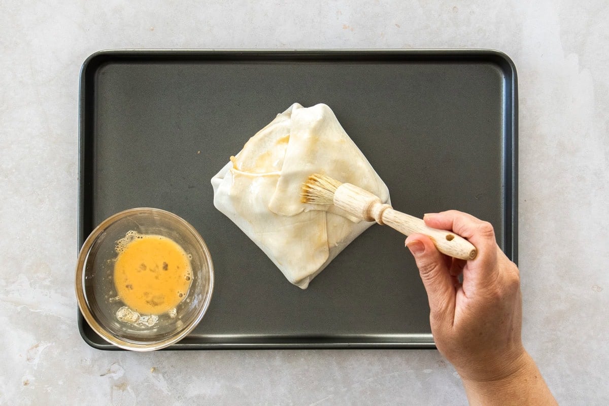 egg wash on top of unbaked dough.