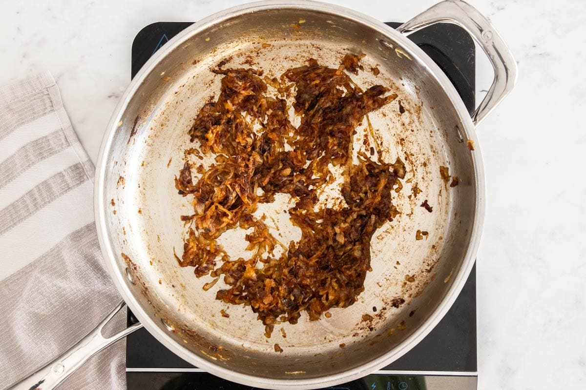 caramelized onions in a stainless skillet.